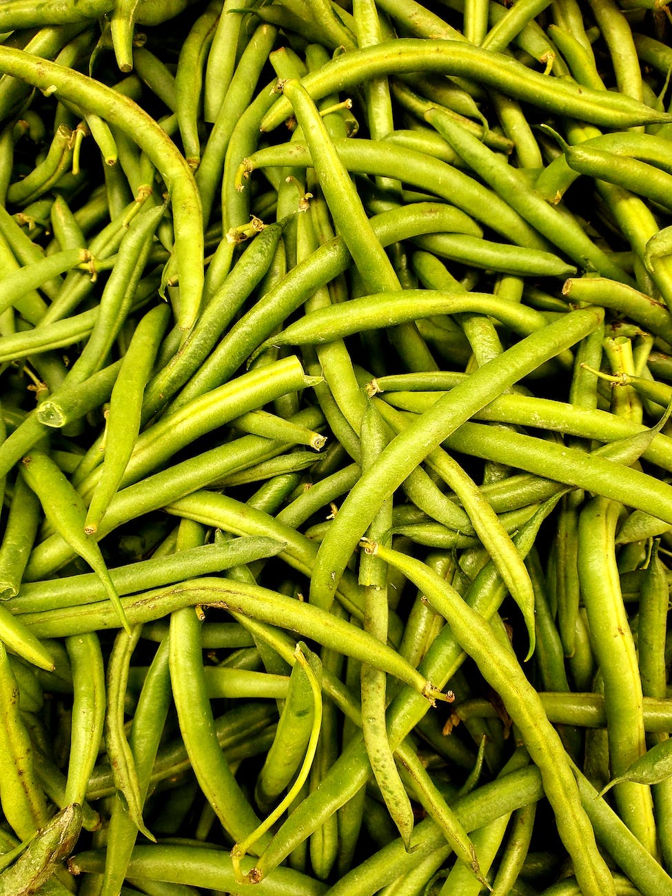 fresh string beans in close up photography